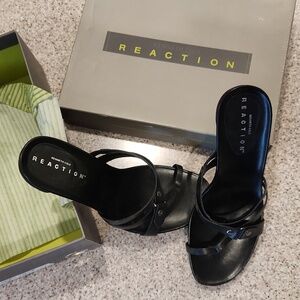 Ladies strappy black sandals.